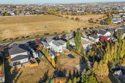 Aerial view of property's location featuring nearby suburban area - 
