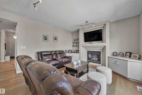 1516 Thorogood Close, Edmonton, AB - Indoor Photo Showing Living Room With Fireplace