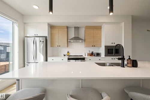 459 39 Street Sw, Edmonton, AB - Indoor Photo Showing Kitchen With Double Sink
