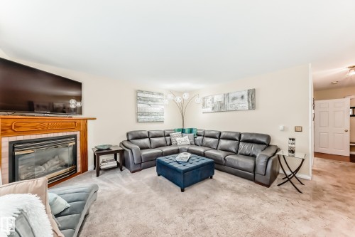 216 Parkallen Way, Wetaskiwin, AB - Indoor Photo Showing Living Room With Fireplace