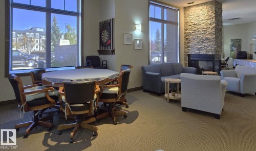 318 160 Magrath Road, Edmonton, AB - Indoor With Fireplace