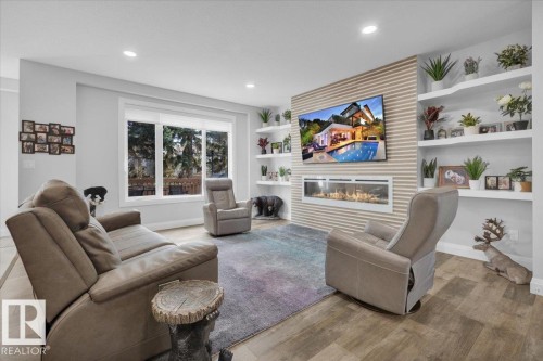 5309 Bon Acres Crescent, Bon Accord, AB - Indoor Photo Showing Living Room With Fireplace