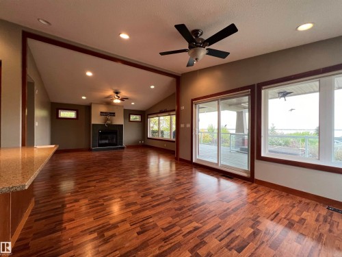 403 55101 Ste. Anne Trail, Rural Lac Ste. Anne County, AB - Indoor Photo Showing Other Room With Fireplace