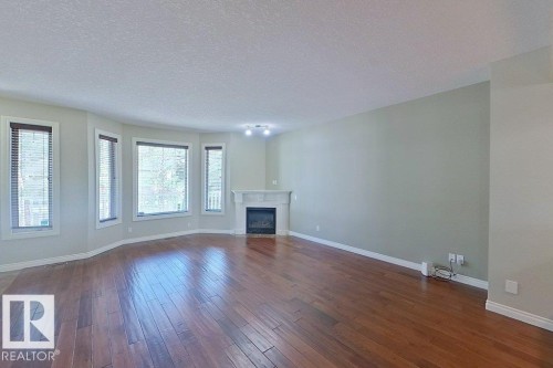 10 903 Rutherford Road Sw, Edmonton, AB - Indoor With Fireplace
