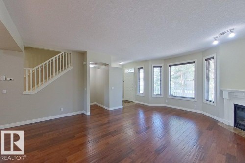 10 903 Rutherford Road Sw, Edmonton, AB - Indoor With Fireplace