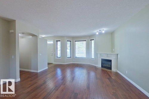 10 903 Rutherford Road Sw, Edmonton, AB - Indoor With Fireplace