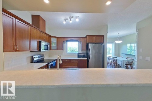 10 903 Rutherford Road Sw, Edmonton, AB - Indoor Photo Showing Kitchen With Double Sink