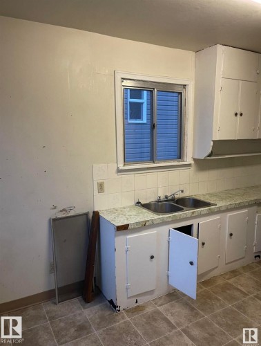 12239 101 Street, Edmonton, AB - Indoor Photo Showing Kitchen With Double Sink