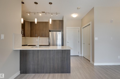 205 17 Columbia Avenue, Devon, AB - Indoor Photo Showing Kitchen With Stainless Steel Kitchen