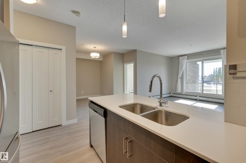 205 17 Columbia Avenue, Devon, AB - Indoor Photo Showing Kitchen With Double Sink