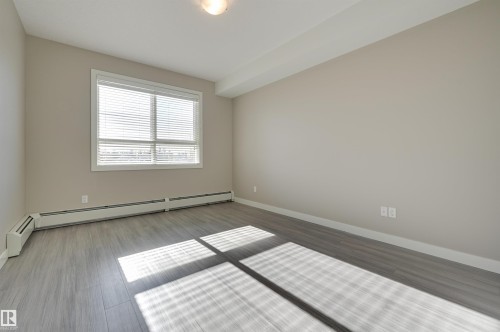 205 17 Columbia Avenue, Devon, AB - Indoor Photo Showing Other Room