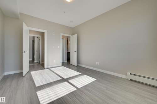 205 17 Columbia Avenue, Devon, AB - Indoor Photo Showing Other Room