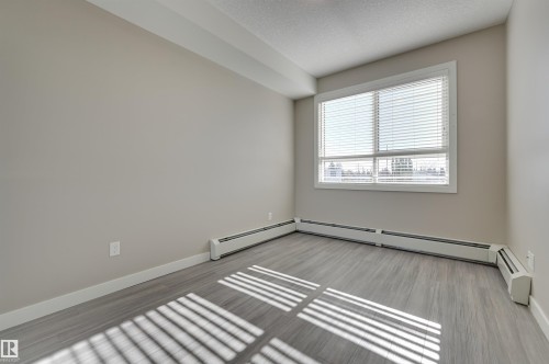 205 17 Columbia Avenue, Devon, AB - Indoor Photo Showing Other Room