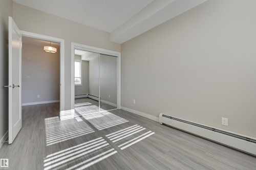 205 17 Columbia Avenue, Devon, AB - Indoor Photo Showing Other Room