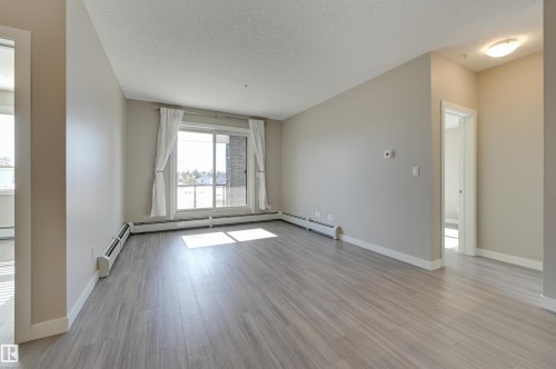 205 17 Columbia Avenue, Devon, AB - Indoor Photo Showing Other Room