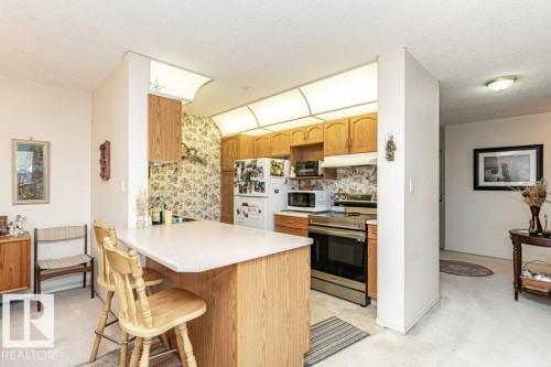 301 911 Rabbit Hill Road, Edmonton, AB - Indoor Photo Showing Kitchen