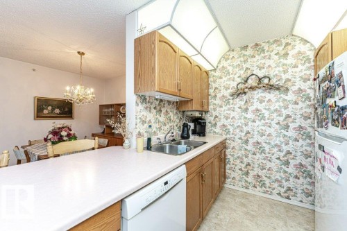 301 911 Rabbit Hill Road, Edmonton, AB - Indoor Photo Showing Kitchen With Double Sink
