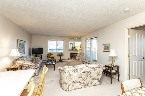 301 911 Rabbit Hill Road, Edmonton, AB - Indoor Photo Showing Living Room