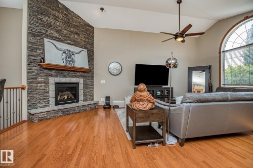 62 Greenfield Wynd, Fort Saskatchewan, AB - Indoor Photo Showing Living Room With Fireplace