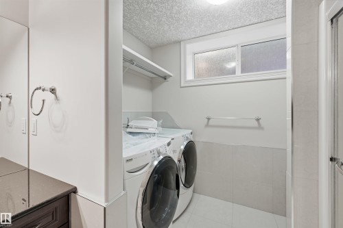 872 Hollands Landing, Edmonton, AB - Indoor Photo Showing Laundry Room