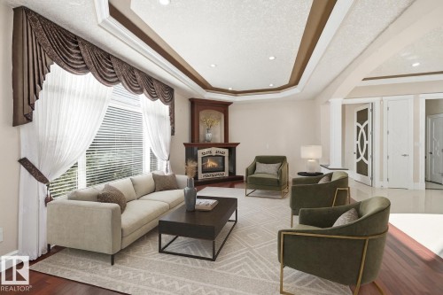 872 Hollands Landing, Edmonton, AB - Indoor Photo Showing Living Room With Fireplace