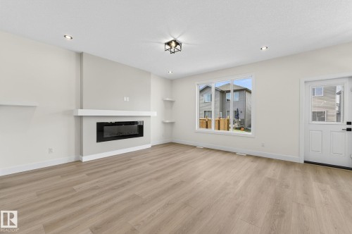 136 Wyatt Ridge, Fort Saskatchewan, AB - Indoor Photo Showing Living Room With Fireplace