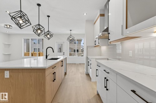 136 Wyatt Ridge, Fort Saskatchewan, AB - Indoor Photo Showing Kitchen With Upgraded Kitchen