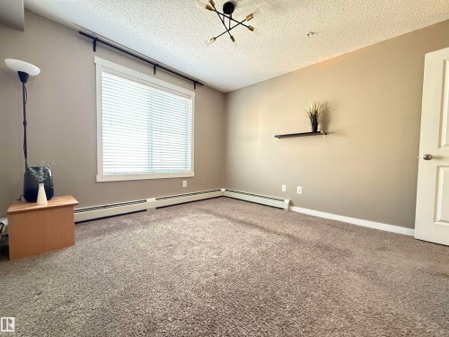 117 18122 77 St Nw, Edmonton, AB - Indoor Photo Showing Other Room