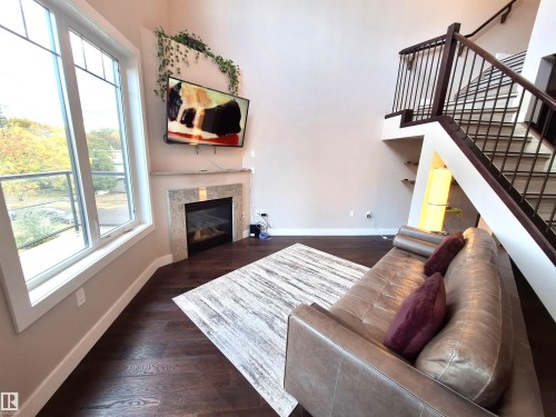 50 11518 76 Avenue, Edmonton, AB - Indoor With Fireplace