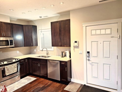 50 11518 76 Avenue, Edmonton, AB - Indoor Photo Showing Kitchen With Double Sink