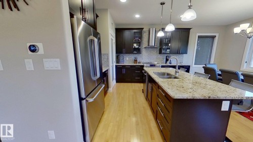11628 16 Avenue Sw, Edmonton, AB - Indoor Photo Showing Kitchen With Double Sink With Upgraded Kitchen