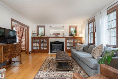 10015 97 Avenue, Edmonton, AB - Indoor Photo Showing Living Room With Fireplace