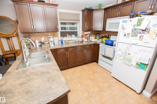 12026 91 Street, Edmonton, AB - Indoor Photo Showing Kitchen With Double Sink