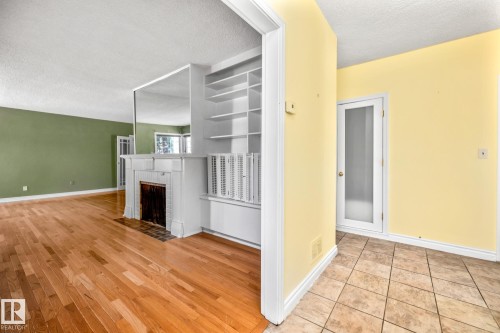 10405 Glenora Crescent, Edmonton, AB - Indoor Photo Showing Other Room With Fireplace