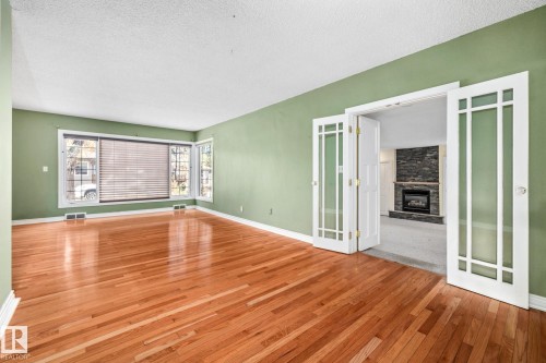 10405 Glenora Crescent, Edmonton, AB - Indoor Photo Showing Other Room With Fireplace