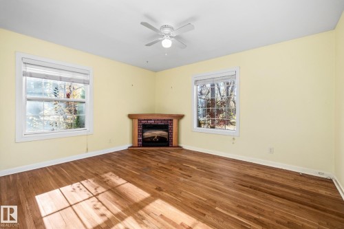 10405 Glenora Crescent, Edmonton, AB - Indoor Photo Showing Living Room With Fireplace