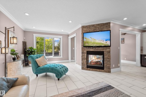 2003 Ainslie Link, Edmonton, AB - Indoor Photo Showing Living Room With Fireplace