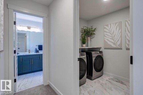 73 Jubilation Drive, St. Albert, AB - Indoor Photo Showing Laundry Room