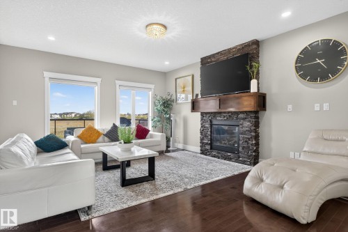 527 Albany Way, Edmonton, AB - Indoor Photo Showing Living Room With Fireplace