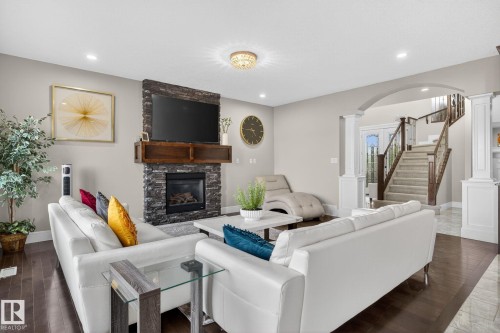 527 Albany Way, Edmonton, AB - Indoor Photo Showing Living Room With Fireplace