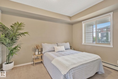 210 5804 Mullen Place, Edmonton, AB - Indoor Photo Showing Bedroom