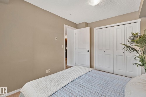 210 5804 Mullen Place, Edmonton, AB - Indoor Photo Showing Bedroom