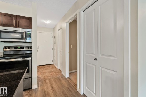 210 5804 Mullen Place, Edmonton, AB - Indoor Photo Showing Kitchen