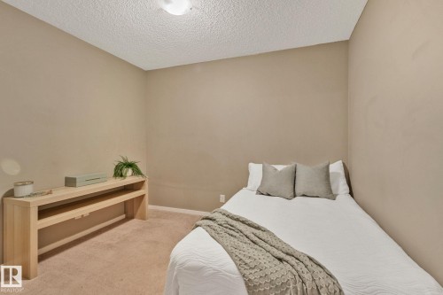210 5804 Mullen Place, Edmonton, AB - Indoor Photo Showing Bedroom