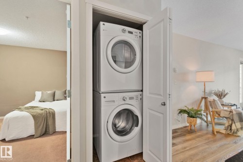 210 5804 Mullen Place, Edmonton, AB - Indoor Photo Showing Laundry Room