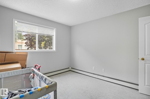 130 17447 98A Ave, Edmonton, AB - Indoor Photo Showing Other Room