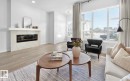 2224 Muckleplum Crescent, Edmonton, AB  - Indoor Photo Showing Living Room With Fireplace 
