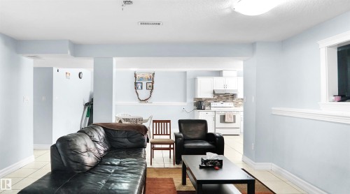 4337 21 Avenue, Edmonton, AB - Indoor Photo Showing Living Room