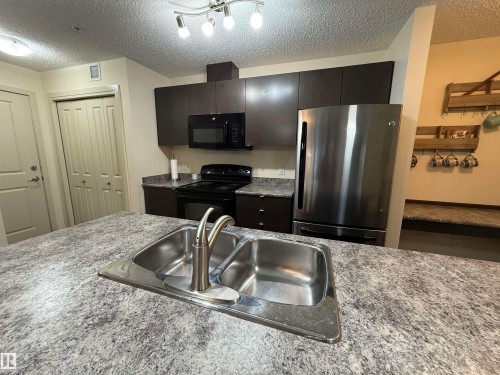 202 340 Windermere Road, Edmonton, AB - Indoor Photo Showing Kitchen With Double Sink