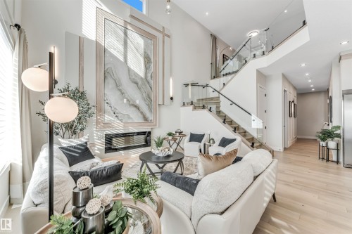 7663 Kimiwan Crescent, Edmonton, AB - Indoor Photo Showing Living Room With Fireplace